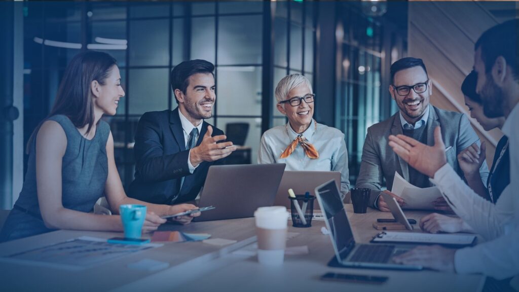 A diverse team of professionals collaborating on a high-performance msp lead generation system for business scalability.