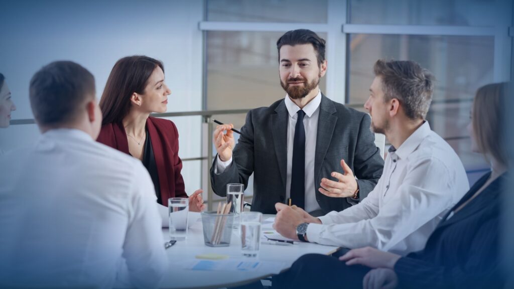 Sales and marketing teams collaborating on B2B lead generation strategy and pipeline management for managed services companies.